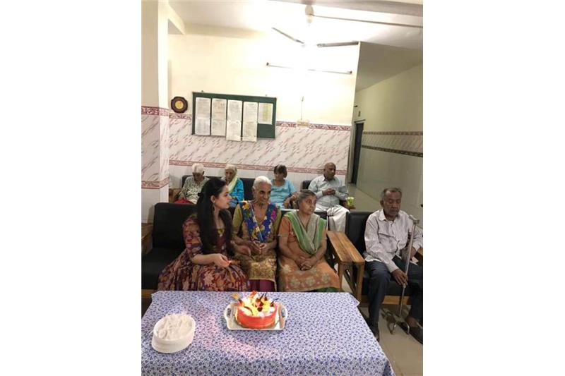 Rupal celebrating Birthday with the residents of Cheshire Home