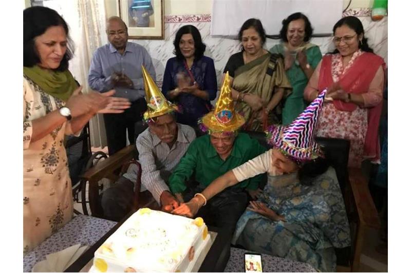 Celebrating Birthday of the Cheshire Home residents with Ms Indira Gupta.