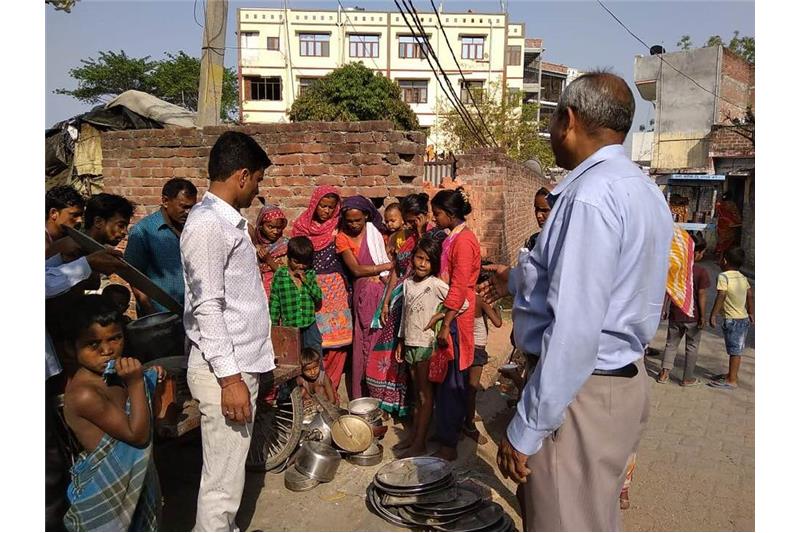 Distribution of old clothes and utensils in our Neighborhood 
