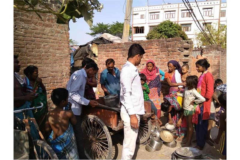 Distribution of old clothes and utensils in our Neighborhood 