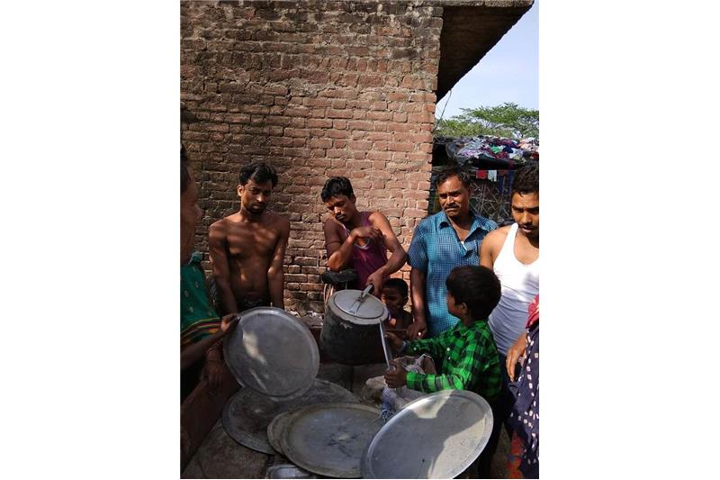 Distribution of old clothes and utensils in our Neighborhood 