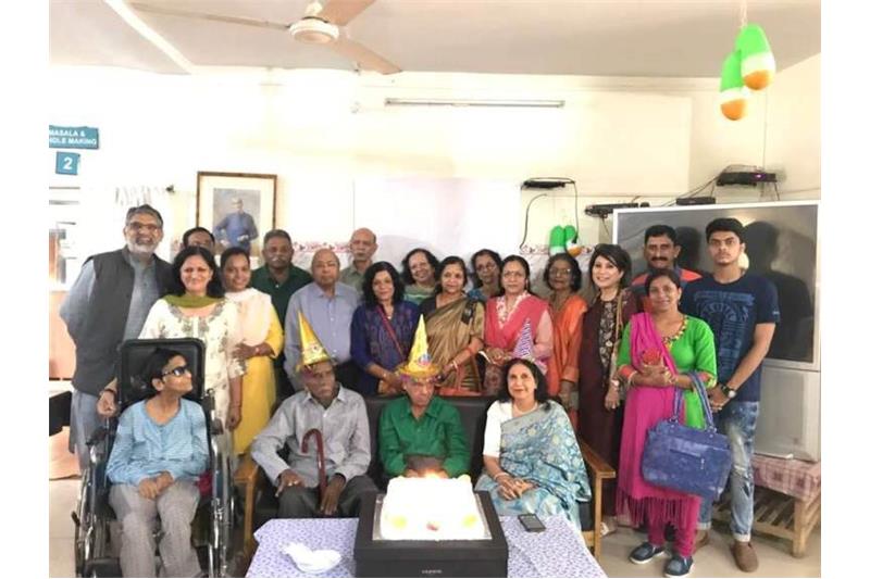 Celebrating Birthday of the Cheshire Home residents with Ms Indira Gupta.